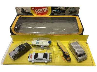 Lot 289 - Corgi Juniors police station set No. 3052 transporter No. 3105, James Bond Spy Who Loved Me gift set No. 3030, E2007 low loader and shovel, No. 2002 Haynor Mk11 car transporter, all boxed (5)