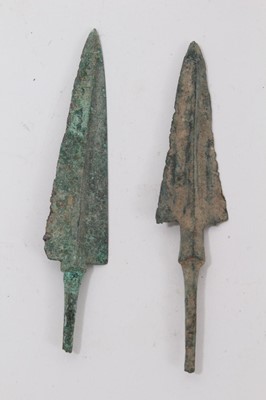 Lot 1073 - Two large Bronze Age arrow heads