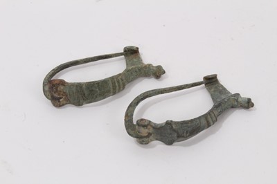 Lot 988 - Two similar Roman bow brooches