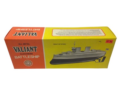 Lot 322 - Sutcliffe Model Valiant Clockwork all metal Battleship & Unda Wunda clockwork tinplate Diving Submarine, both boxed (2)