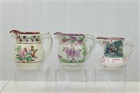 Lot 2257 - Three 19th century lustre jugs - one decorated...