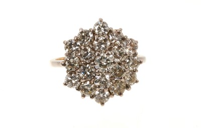 Lot 736 - Large diamond cluster ring with a hexagonal cluster of 19 brilliant cut diamonds in tiered claw setting on gold shank. Estimated total diamond weight approximately 2.3cts.