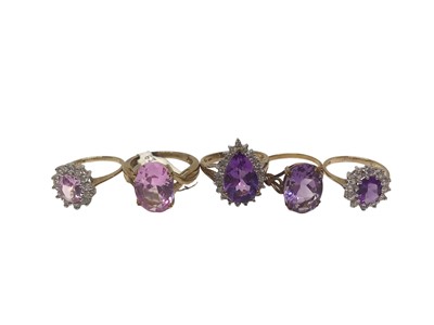 Lot 275 - Five 9ct gold and gem-set dress rings with amethysts and pink stones