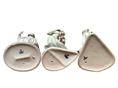 Lot 1138 - Collection of five Lladro figures together with a NAO dog (6)