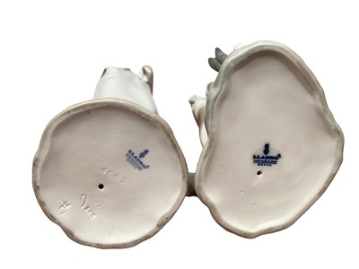 Lot 1138 - Collection of five Lladro figures together with a NAO dog (6)