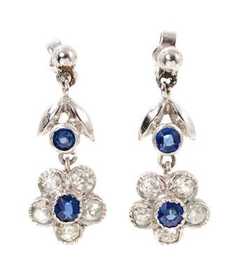 Lot 733 - Pair of white gold sapphire and diamond flower head drop earrings