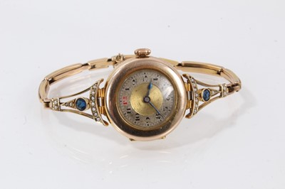 Lot 877 - 9ct gold wristwatch on 9ct gold bracelet set with sapphires and seed pearls