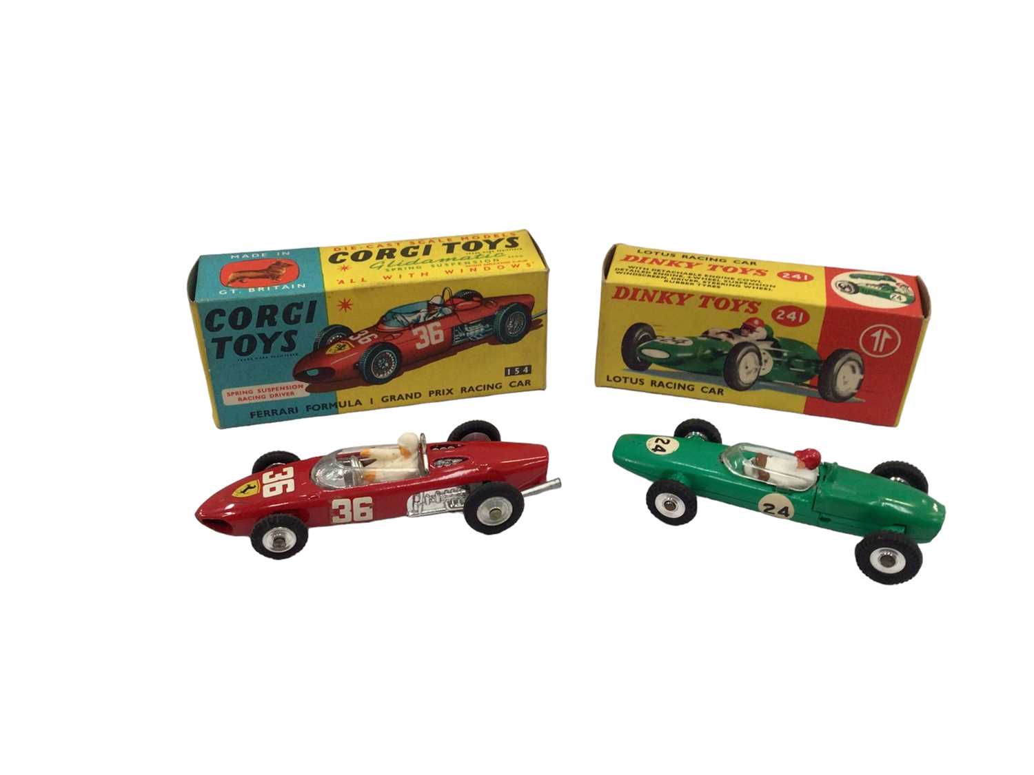 Lot 1810 - Corgi Aston Martin DB4 No. 218, Fiat No. 232, E Type Jaguar with detachable hard top No. 307, Lotus Racing Car No. 241. Ferrari Formula 1 No. 154 all boxed (5)