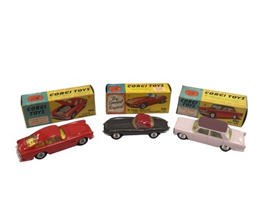 Lot 1810 - Corgi Aston Martin DB4 No. 218, Fiat No. 232, E Type Jaguar with detachable hard top No. 307, Lotus Racing Car No. 241. Ferrari Formula 1 No. 154 all boxed (5)