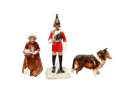 Lot 1143 - Royal Doulton Iconic London figure - Lifeguard HN5364, together with a Royal Doulton dog, and another Royal Doulton figure - Teatime HN2255 (3)