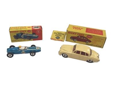 Lot 1817 - Dinky Morris 1100 No. 140, Volkswagon 1500 No. 144, Jaguar 3.4 Saloon No. 195 Cooper Racing Car No. 240 all boxed  (4)