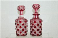 Lot 2275 - Pair ruby cut glass decanters with stoppers