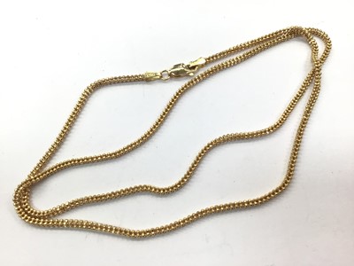 Lot 1037 - 18ct gold beaded link chain, 50cm long