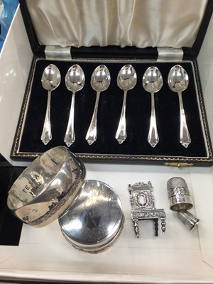 Lot 1038 - Set of six silver coffee spoons in fitted case, miniature silver chair, white metal trinket pot with animal decoration, white metal Niello bangle and two thimbles