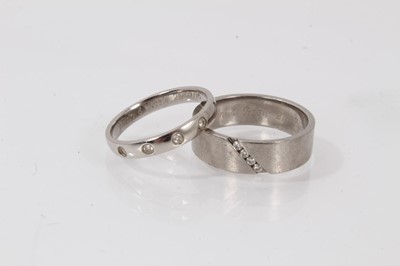 Lot 795 - Two palladium diamond wedding rings