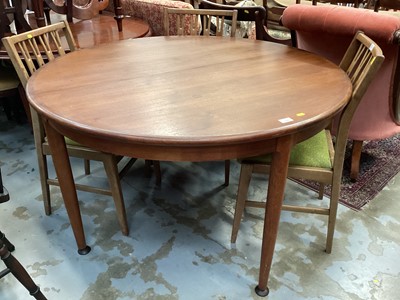 Lot 1337 - Mid-Century teak circular extending dining room table and six chairs