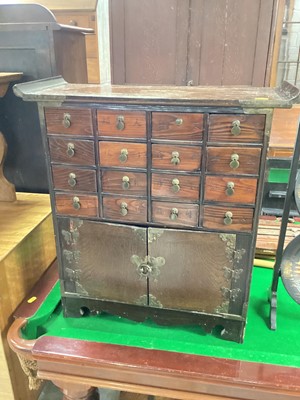 Lot 1272 - Chinese cabinet withh16 drawers and cupboards, together with a Chinese dressing/toiletry box (2)