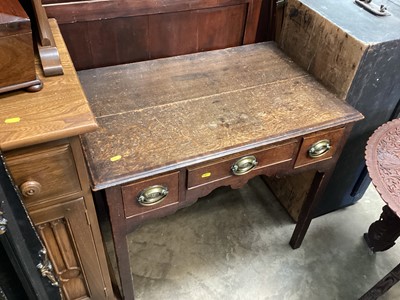 Lot 1249 - George III oak lowboy