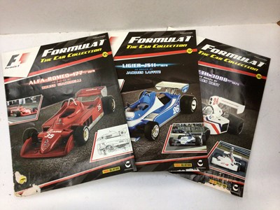 Lot 1883 - Large collection of Formula 1 'The Car Collection' unopened magazines with blister pack cars