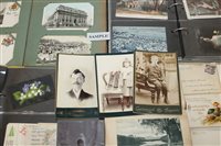 Lot 2405 - PostCarsds in six albums - including early...