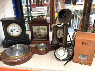 Lot 384 - Black slate mantel clock, two other mantel clocks, a contemporary wall barometer, vintage style telephone and a meter multi-range in leather case