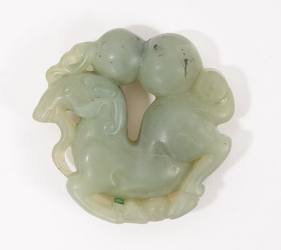 Lot 1004 - Chinese green hardstone pierced carving of a horse