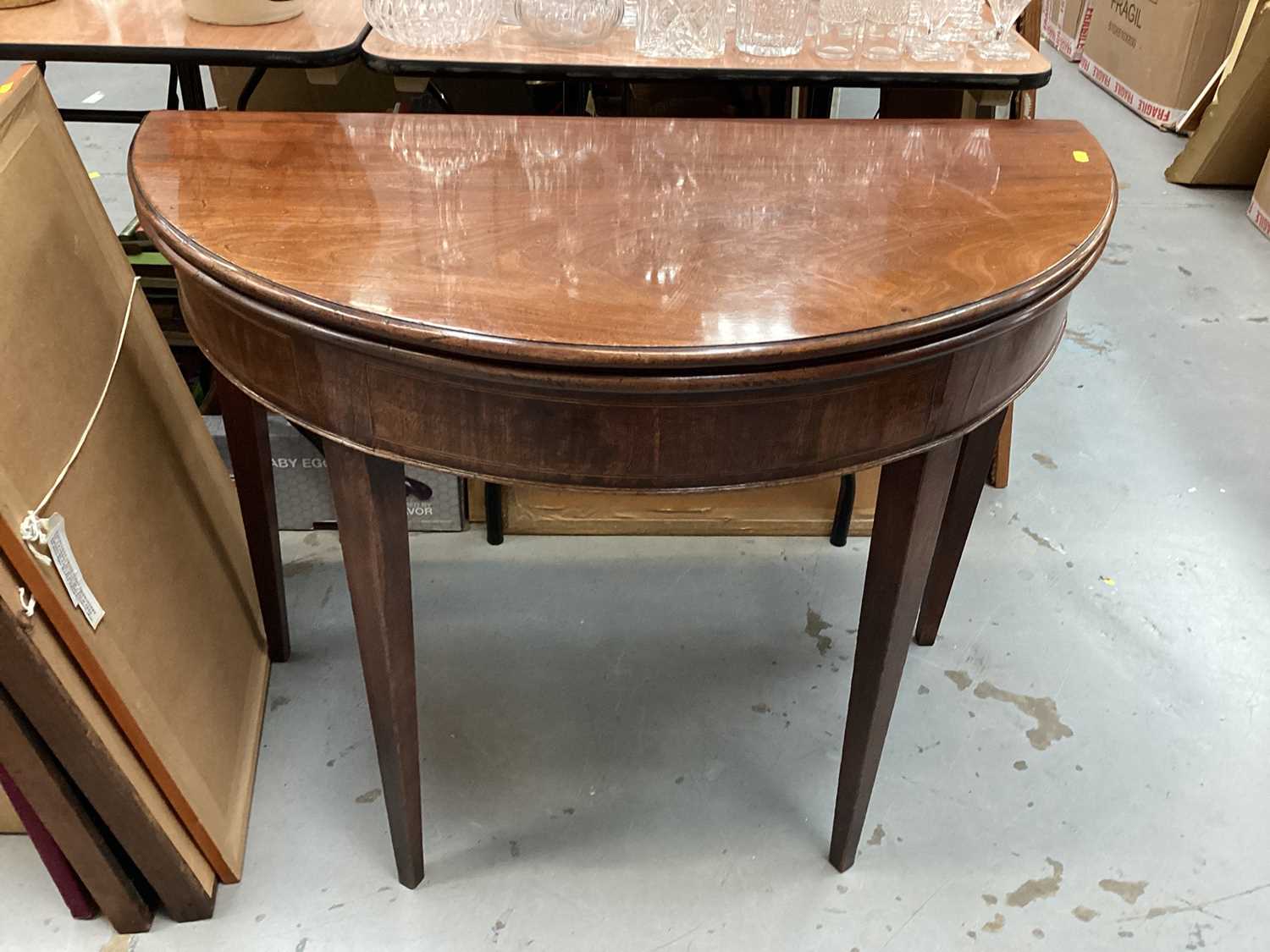 Lot 1348 - George III mahogany demi lune card table