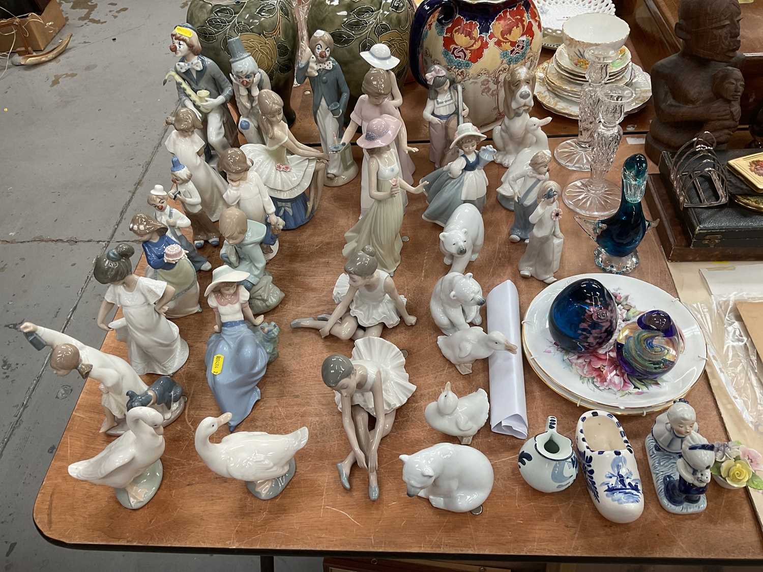 Lot 483 - Quantity of Lladro, Nao, and Cascades figures, including polar bears, clowns, etc, together with Delft, Coalport and other china