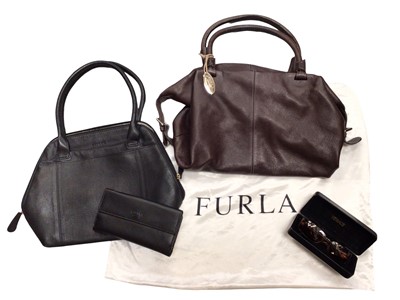 Lot 388 - Furla brown leather handbag in satin dust bag, Osprey London black leather handbag with matching purse and pair of Versace sunglasses in case