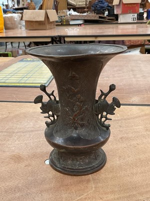 Lot 760 - Japanese bronze patinated two handled vase, 18cm high