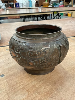 Lot 619 - Eastern bronze footed bowl, with incised stylised decoration, 14cm high