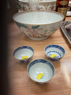 Lot 624 - 18th century Chinese export porcelain Famille Rose punch bowl, together with three 18th century Chinese porcelain tea bowls (4)