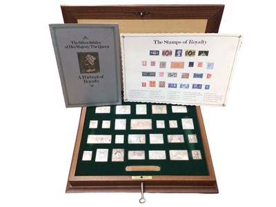 Lot 67 - The Africana Commemorative Mint - 'The Queen's Silver Jubilee - Stamps of Royalty Collection' silver ingot set in fitted wooden case