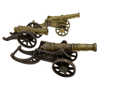 Lot 797 - Three brass table cannons on gun carriages (3)