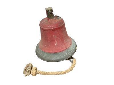 Lot 845 - Large red painted fire bell with clapper, 27cm in height.