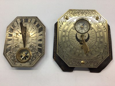 Lot 1047 - Miniature silver sundial mounted with a compass, 6cm x 4.5cm and one other similar sundial (2)