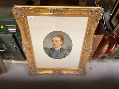 Lot 538 - Victorian overpainted photograph of a lady, mounted in glazed gilt frame.