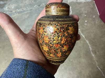 Lot 1094 - Collection of antique Indian Kashmiri lacquer ware - pair of cups and covers with bone finials and small vase and cover and two rectangular boxes