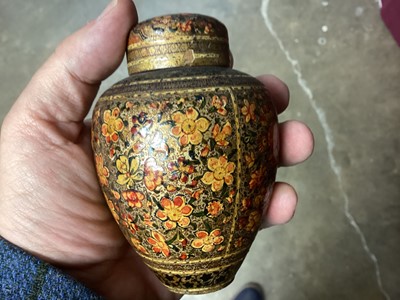Lot 1094 - Collection of antique Indian Kashmiri lacquer ware - pair of cups and covers with bone finials and small vase and cover and two rectangular boxes