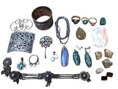 Lot 58 - Group of silver and white metal jewellery including a multi gem set pendant, paste set buckle brooch, Chinese napkin ring and some loose stones