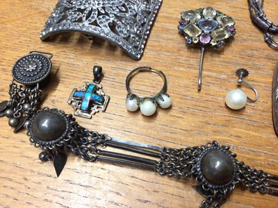 Lot 58 - Group of silver and white metal jewellery including a multi gem set pendant, paste set buckle brooch, Chinese napkin ring and some loose stones