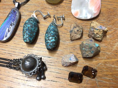 Lot 58 - Group of silver and white metal jewellery including a multi gem set pendant, paste set buckle brooch, Chinese napkin ring and some loose stones