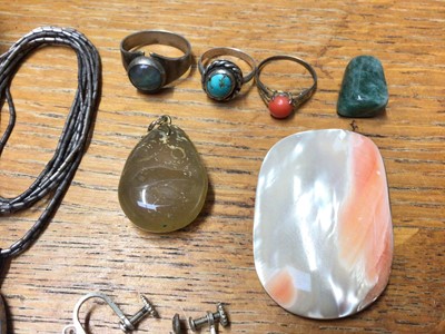 Lot 58 - Group of silver and white metal jewellery including a multi gem set pendant, paste set buckle brooch, Chinese napkin ring and some loose stones