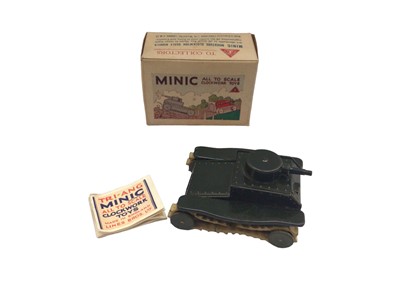 Lot 1829 - Tri-Ang Minic grey tank in original box, with leaflet but no key.