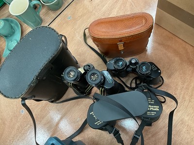 Lot 473 - Three pairs of binoculars, two with cases.