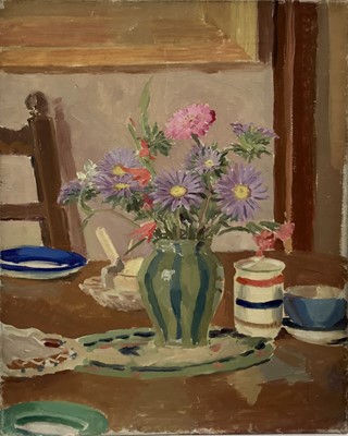 Lot 126 - English school, 20th century oil on canvas, still life of flowers on a dining table with coloured ceramics, 43x54cm