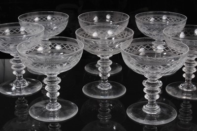 Lot 291 - Set of 19th century crystal champagne coupes with acid etched borders and three annular knops to stems.  c.1880-1900 possibly French or Belgian