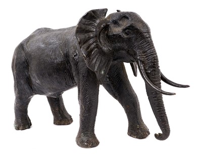 Lot 1084 - Bronze model of an elephant