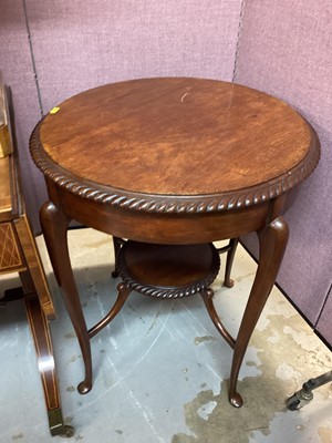 Lot 1308 - Edwardian mahogany two tier table and two plant stands (3)