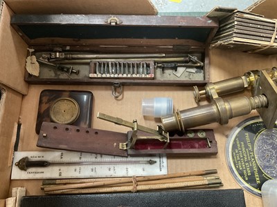 Lot 204 - Collection of various scientific instruments, microscope, cased sovereign scales, primes stove etc